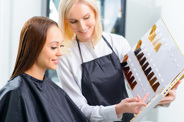 Client is choosing perfect hair tint.